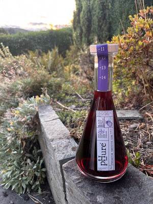pHure Blackberry & Apple Gin at dusk